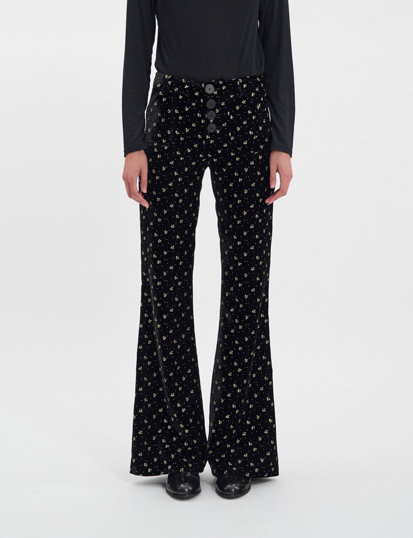 Pantalone Charlotte di terciopelo nero liso con stampa dorata