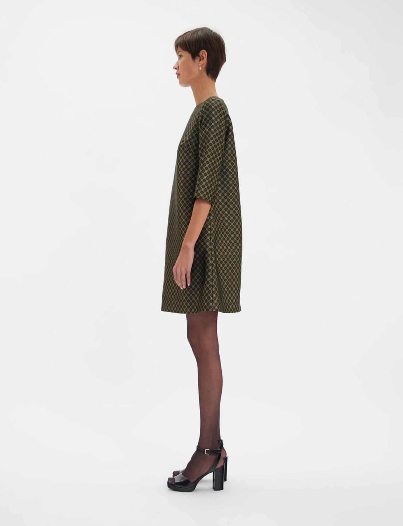 Megan abito nero e oro con trama jacquard