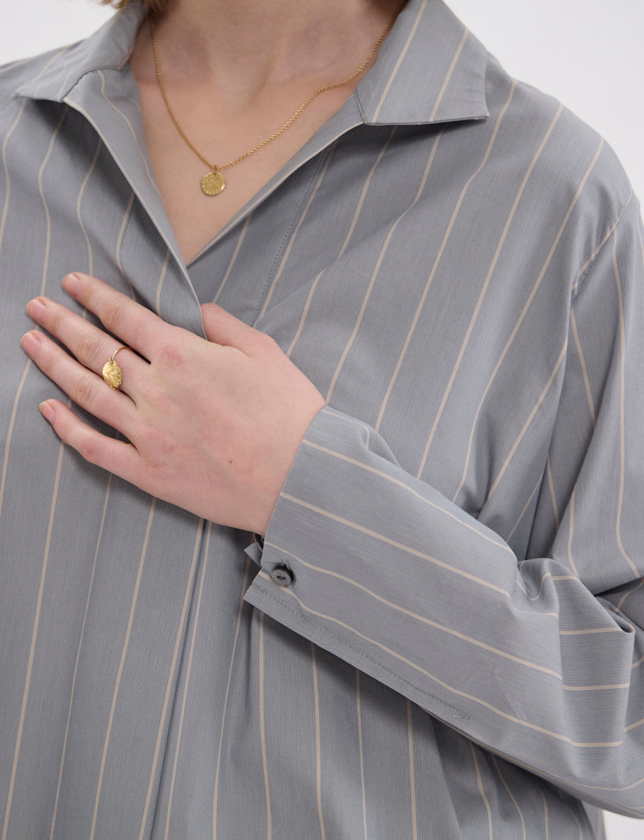 Top Noa verde mandorla a righe sottili