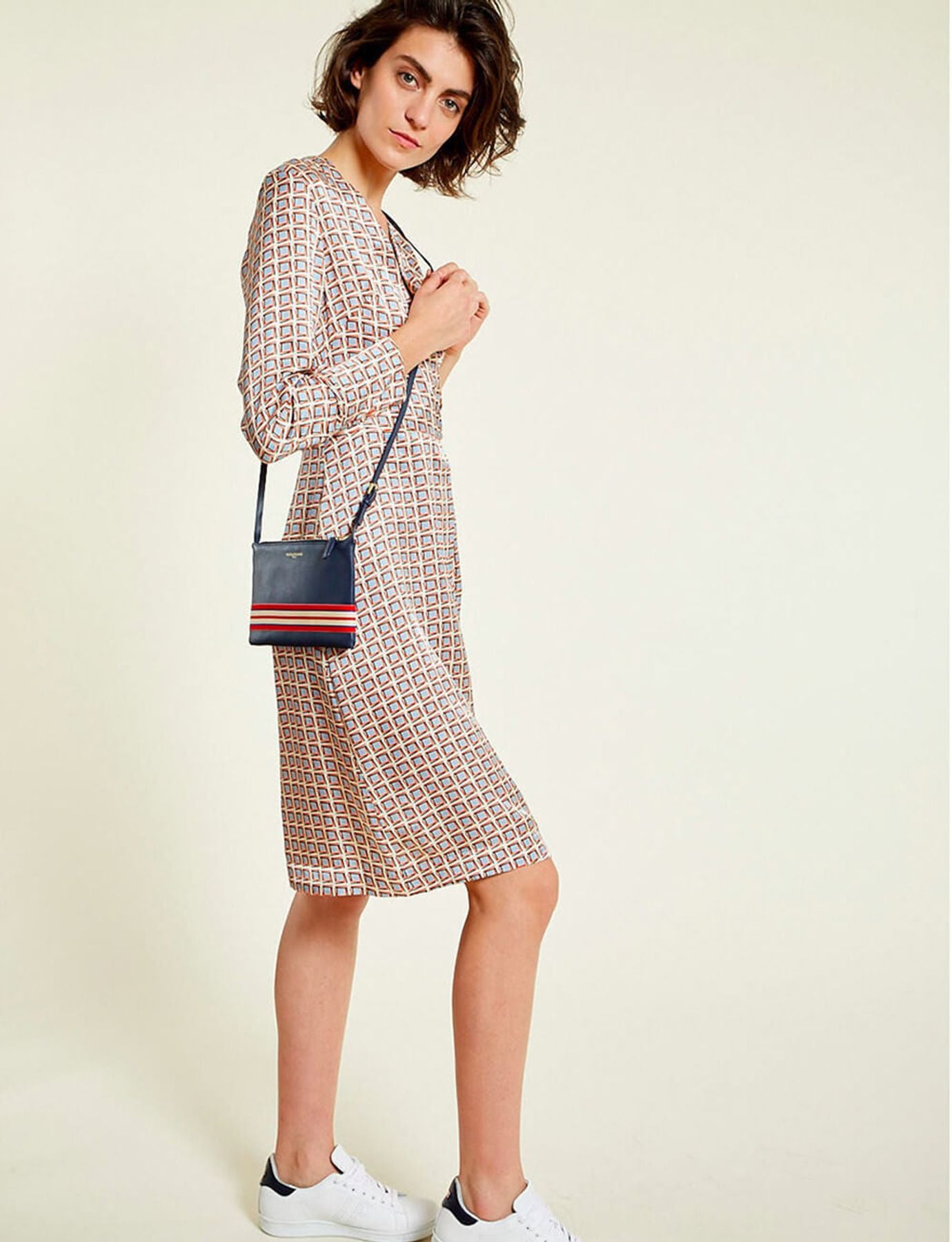 Le Parisien navy leather clutch bag