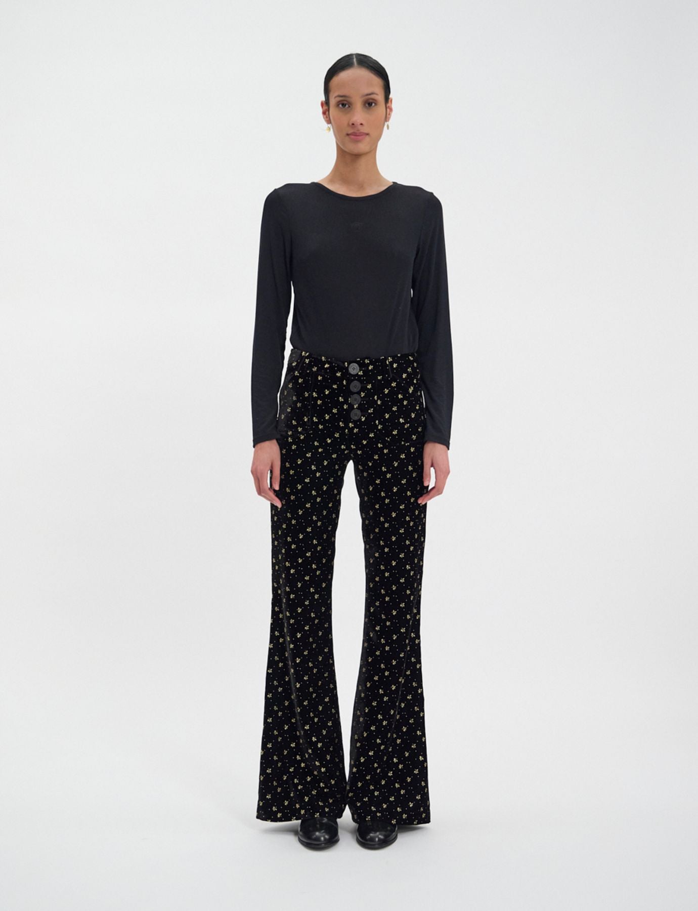 Pantaloni Charlotte in velluto nero liscio con stampa dorata