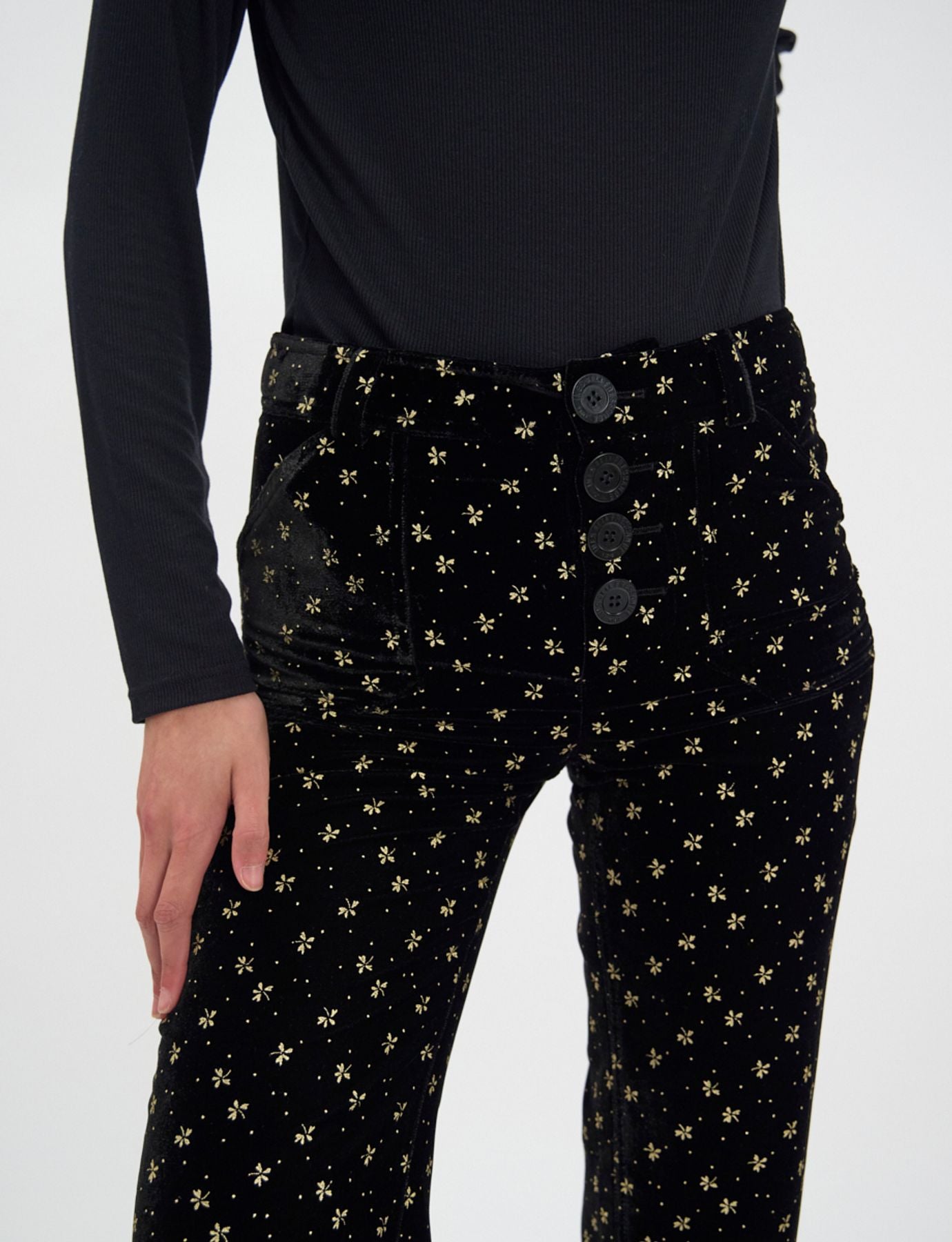 Pantalone Charlotte di terciopelo nero liso con stampa dorata